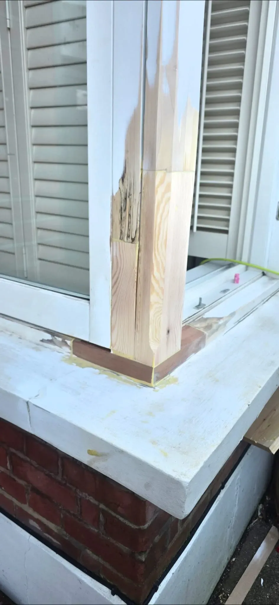 Spliced timber repair on a period sash window box frame and sill