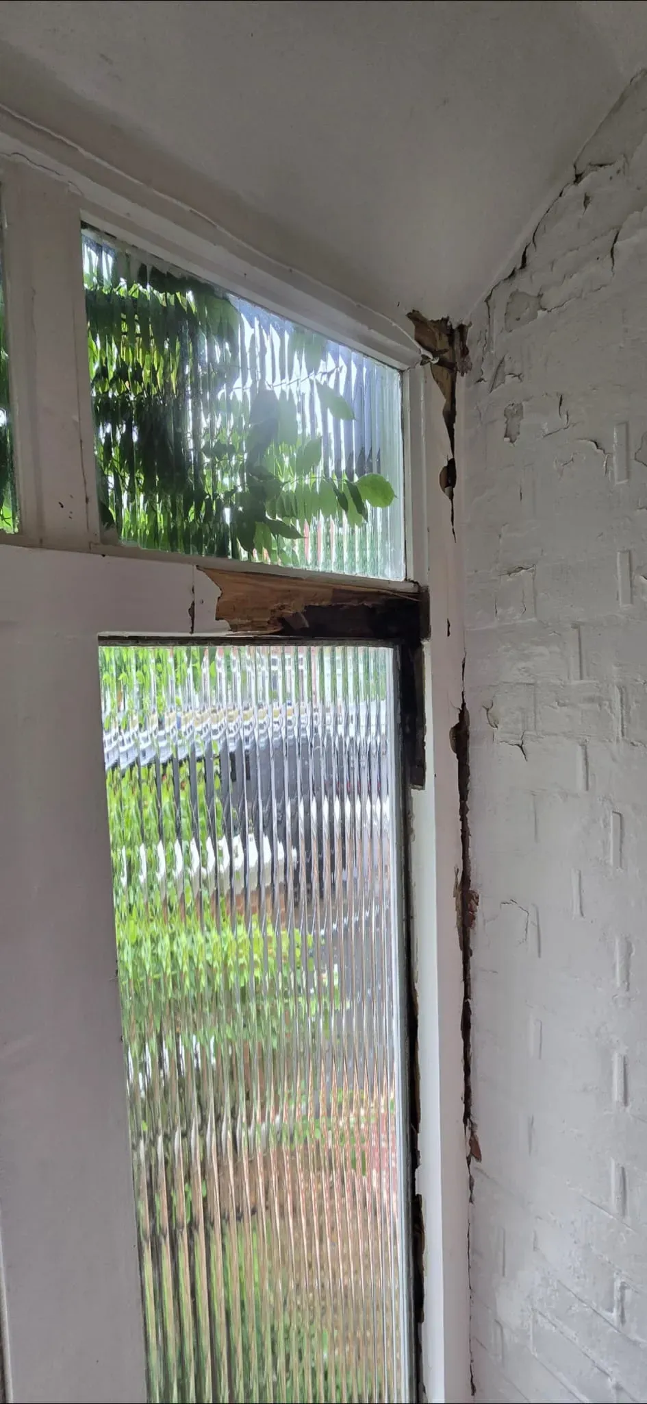 Damaged and rotted timber window frame with structural decay requiring timber box frame repair